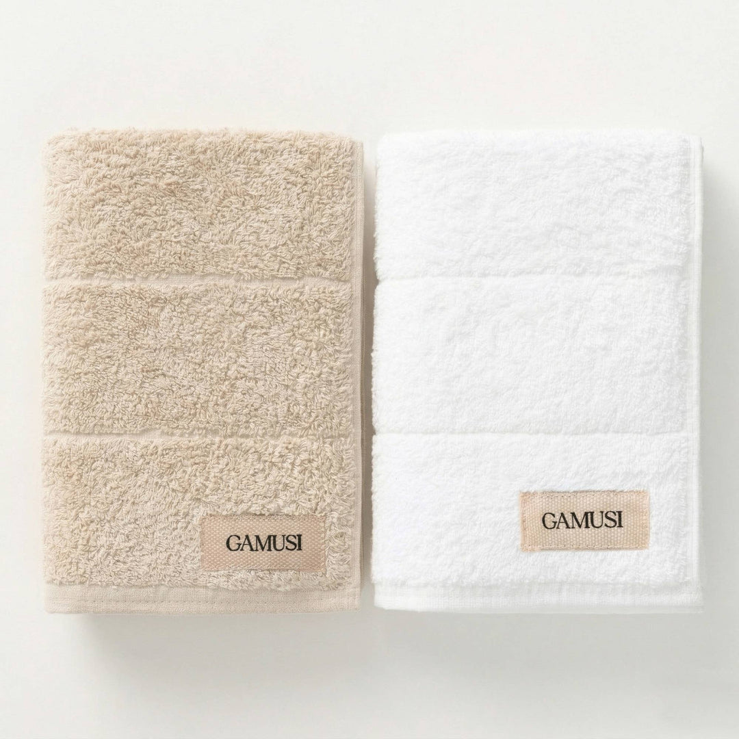 Lot de 4 serviettes de bain en éponge 100 % coton bicolore 600 g