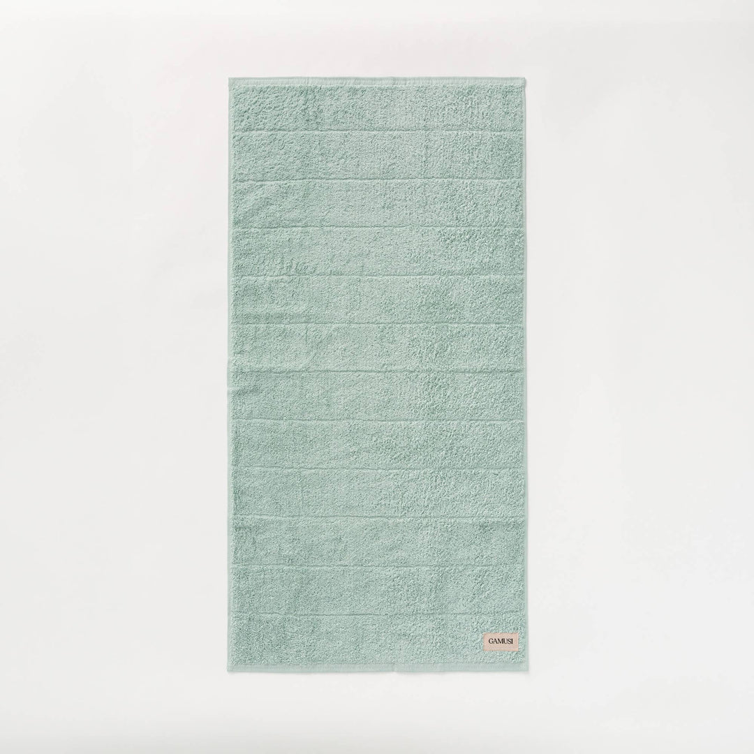 Lot de 4 serviettes de bain en éponge 100 % coton bicolore 600 g
