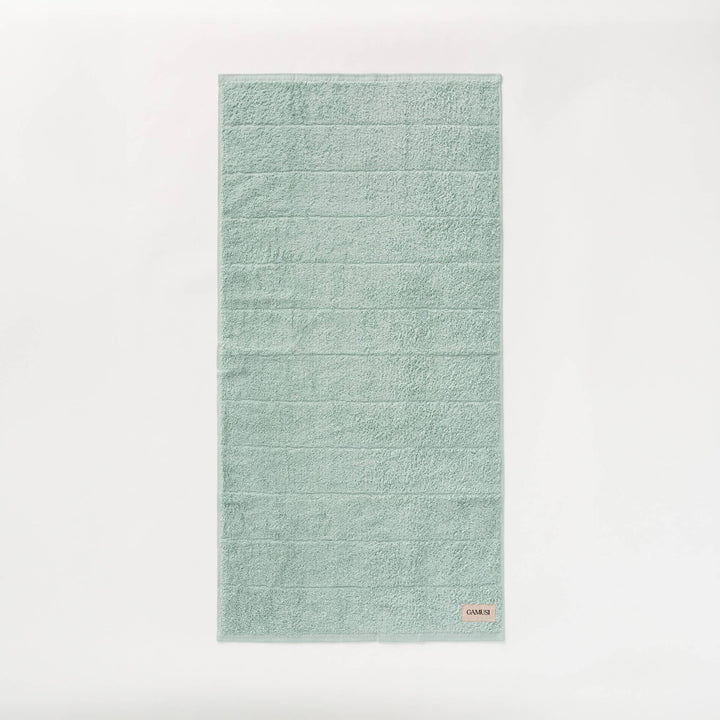 Lot de 4 serviettes de bain en éponge 100 % coton bicolore 600 g