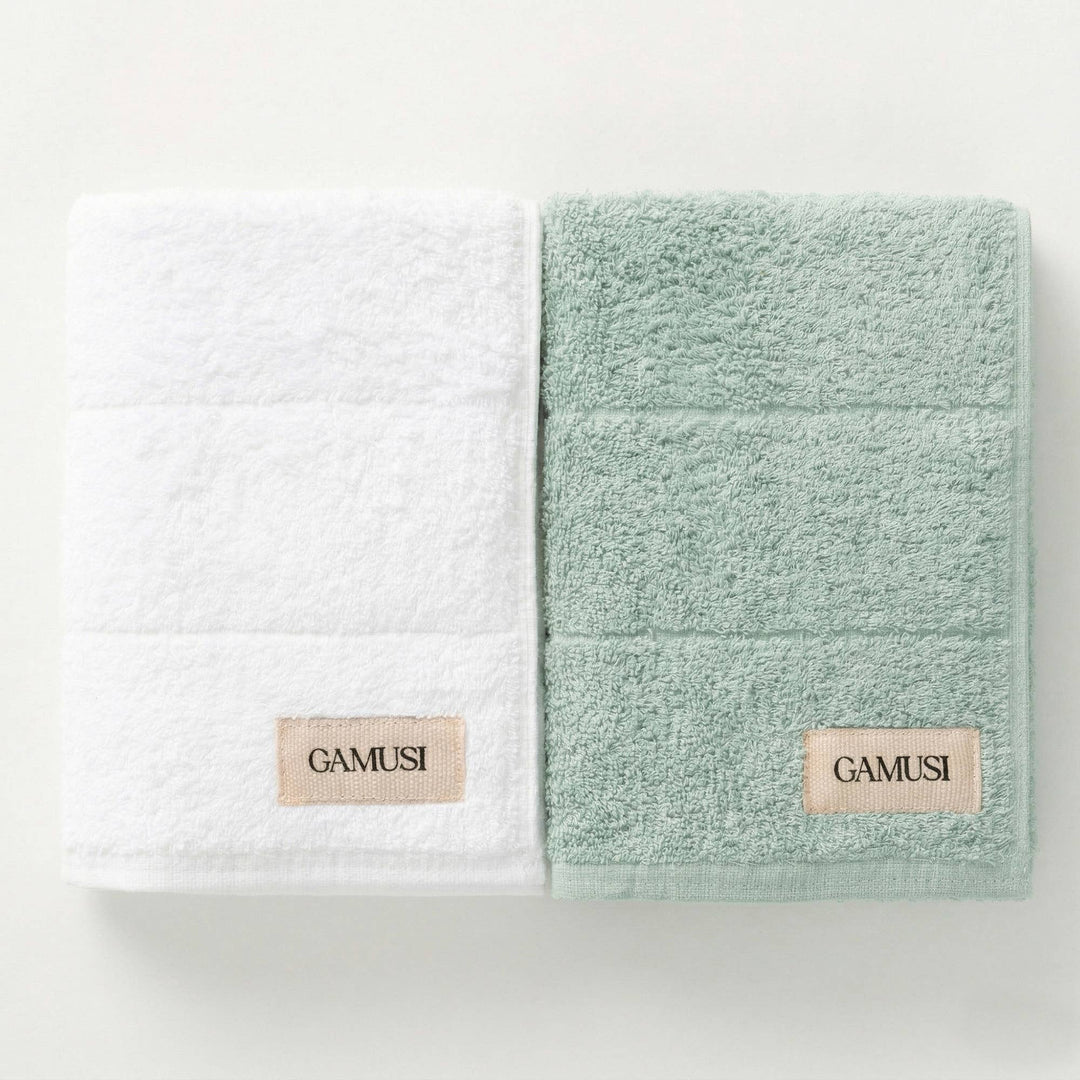 Lot de 4 serviettes de bain en éponge 100 % coton bicolore 600 g