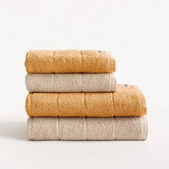 Lot de 4 serviettes de bain en éponge 100 % coton bicolore 600 g